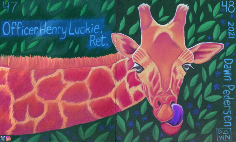 giraffe created on sidewalk in artist's chalk
